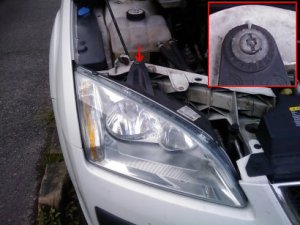 How to remove headlight bulb from 2001 ford focus